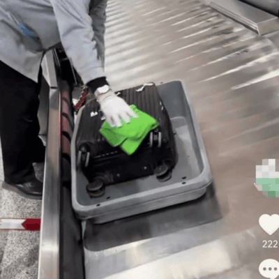 机场回应擦行李箱作秀质疑